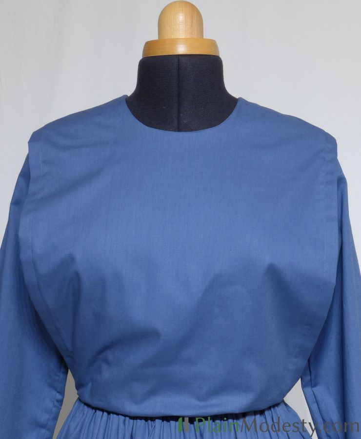 Cape Dress Front View Front view of a cape dress with a Narrow, Straight, Loose cape