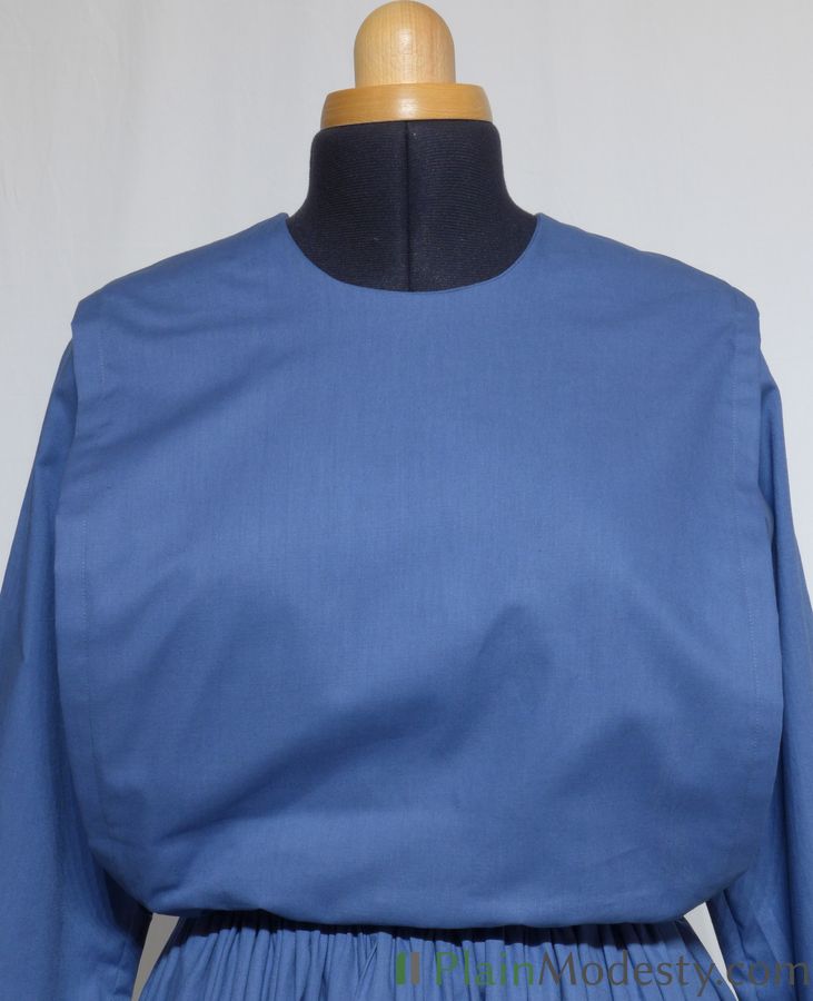 Cape Dress Front View Front view of a cape dress with a Narrow, Straight, Loose, Gaping cape