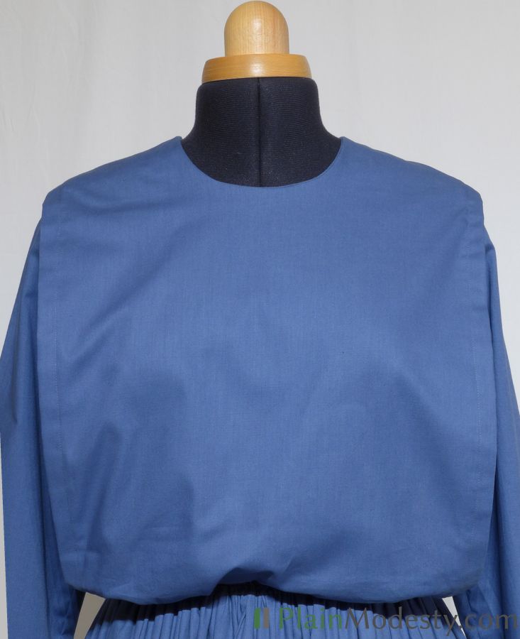 Cape Dress Front View Front view of a cape dress with a Narrow, Straight, Loose, Gathered, Gaping cape