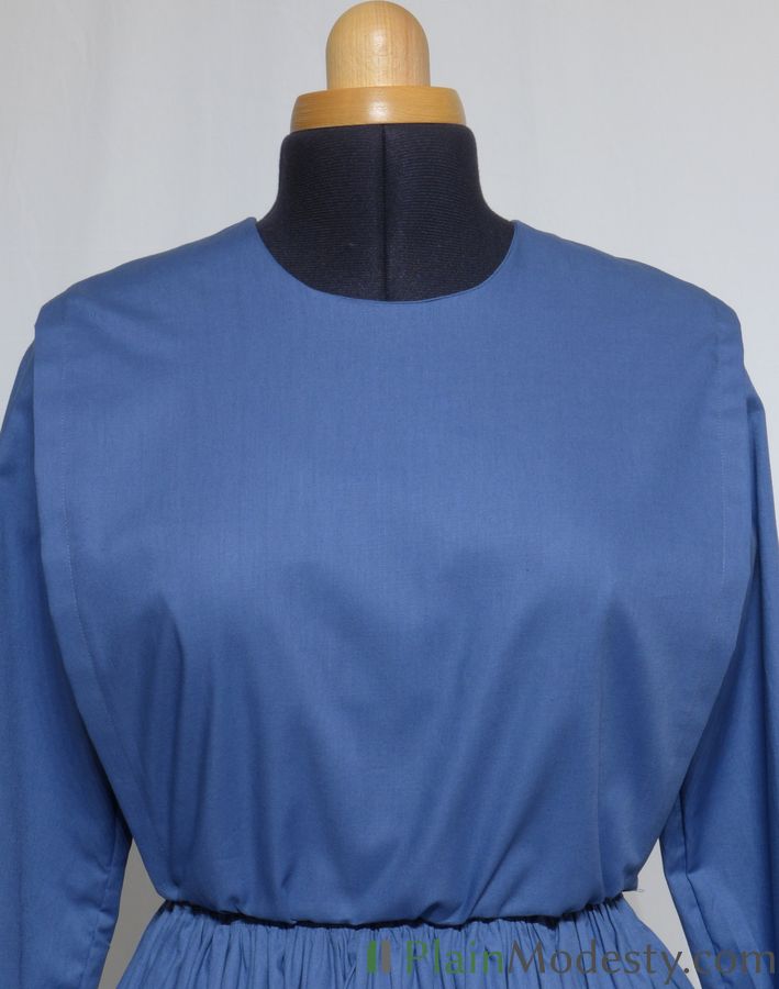 Cape Dress Front View Front view of a cape dress with a Narrow, Straight, Gathered, Tapered cape