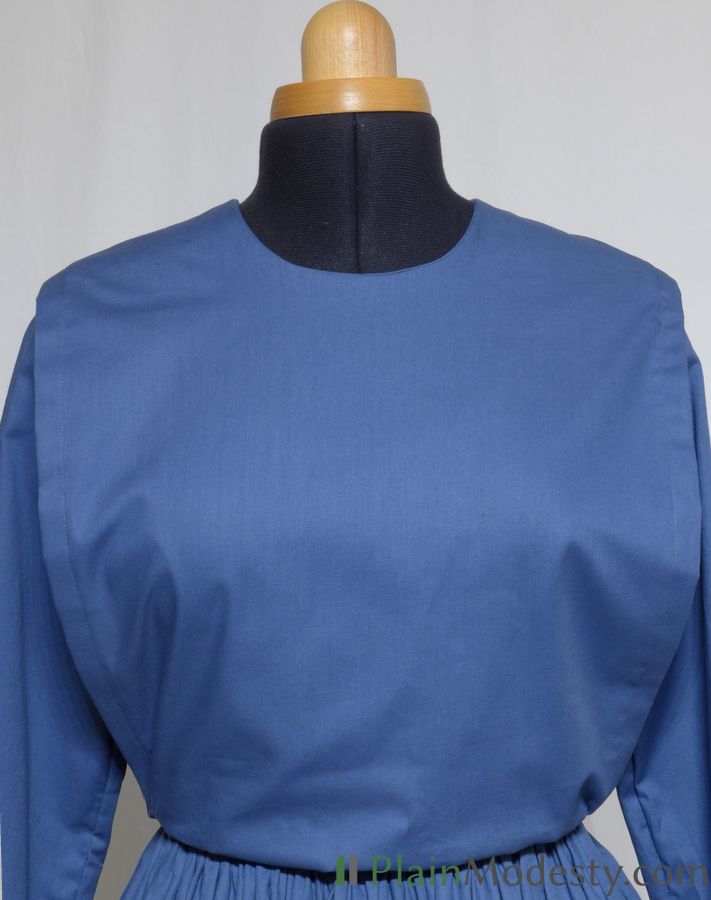 Cape Dress Front View Front view of a cape dress with a Narrow, Straight, Loose, Tapered cape