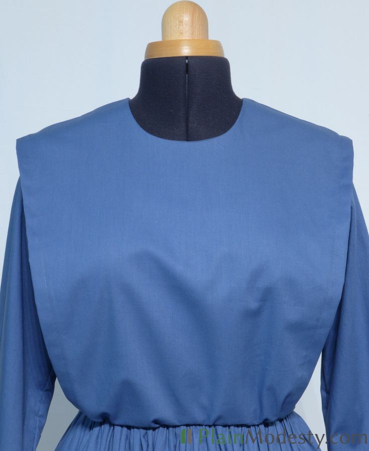 Cape Dress Front View Front view of a cape dress with a Wide, Slanted, Gathered, Gaping cape