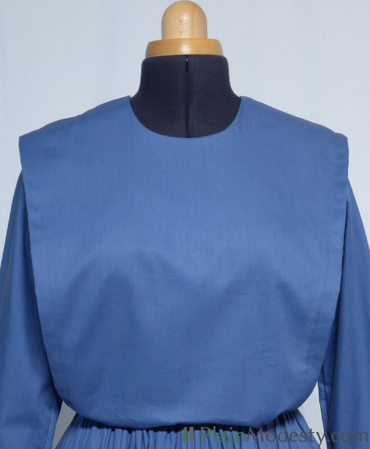 Cape Dress Front View Front view of a cape dress with a Wide, Slanted, Gathered, Loose, Gaping cape