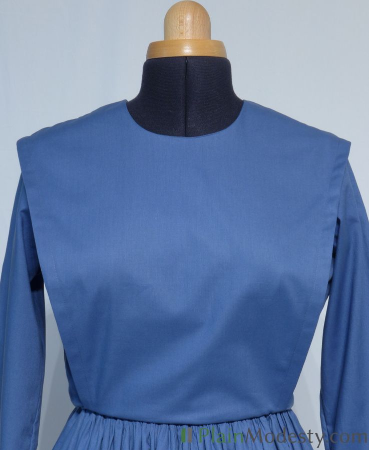 Cape Dress Front View Front view of a cape dress with a Wide, Slanted cape