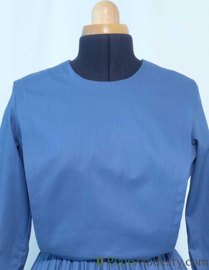 Cape Dress Front View Front view of a cape dress with a Narrow, Slanted, Loose, Gaping cape