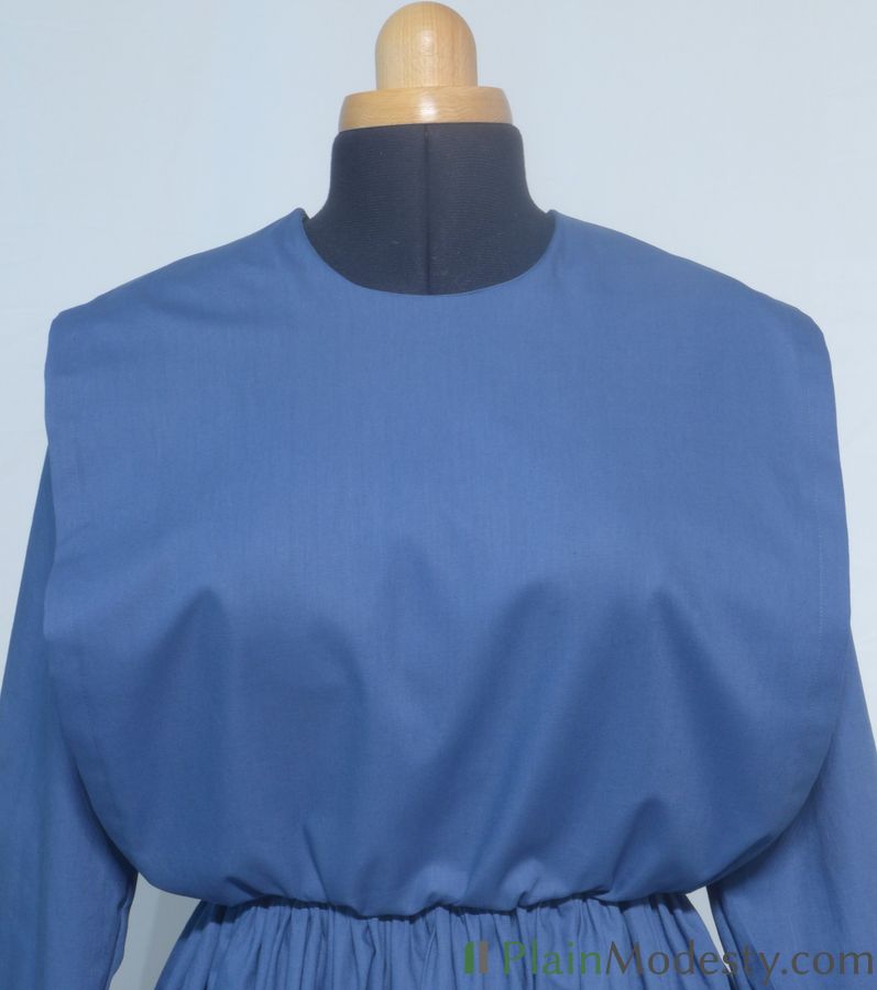 Cape Dress Front View Front view of a cape dress with a Wide, Straight, Gathered, Gaping cape