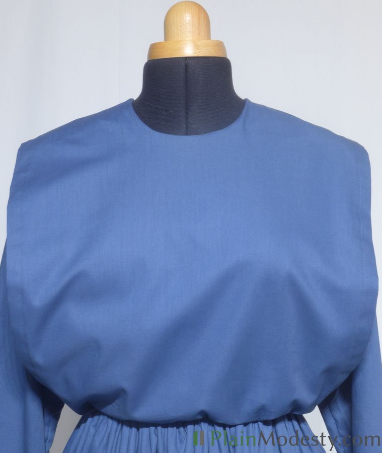 Cape Dress Front View Front view of a cape dress with a Wide, Straight, Loose, Gaping cape