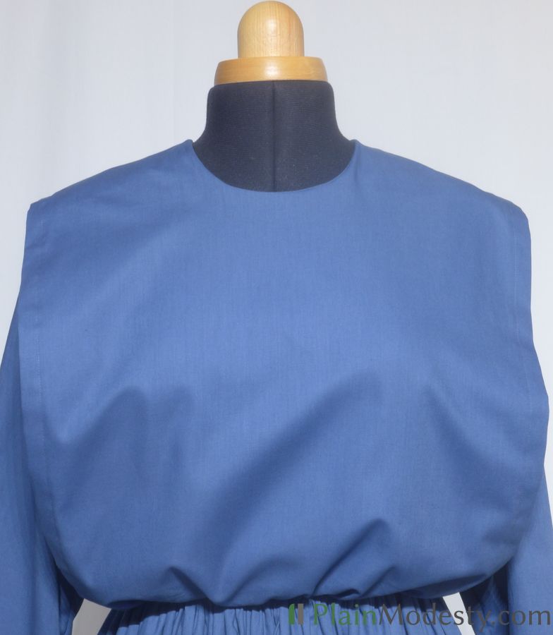 Cape Dress Front View Front view of a cape dress with a Wide, Straight, Gathered, Loose, Gaping cape