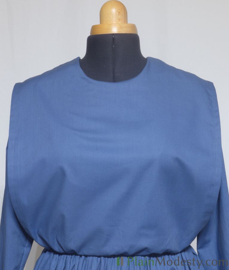 Cape Dress Front View Front view of a cape dress with a Wide, Straight, Loose, Slightly Gathered cape